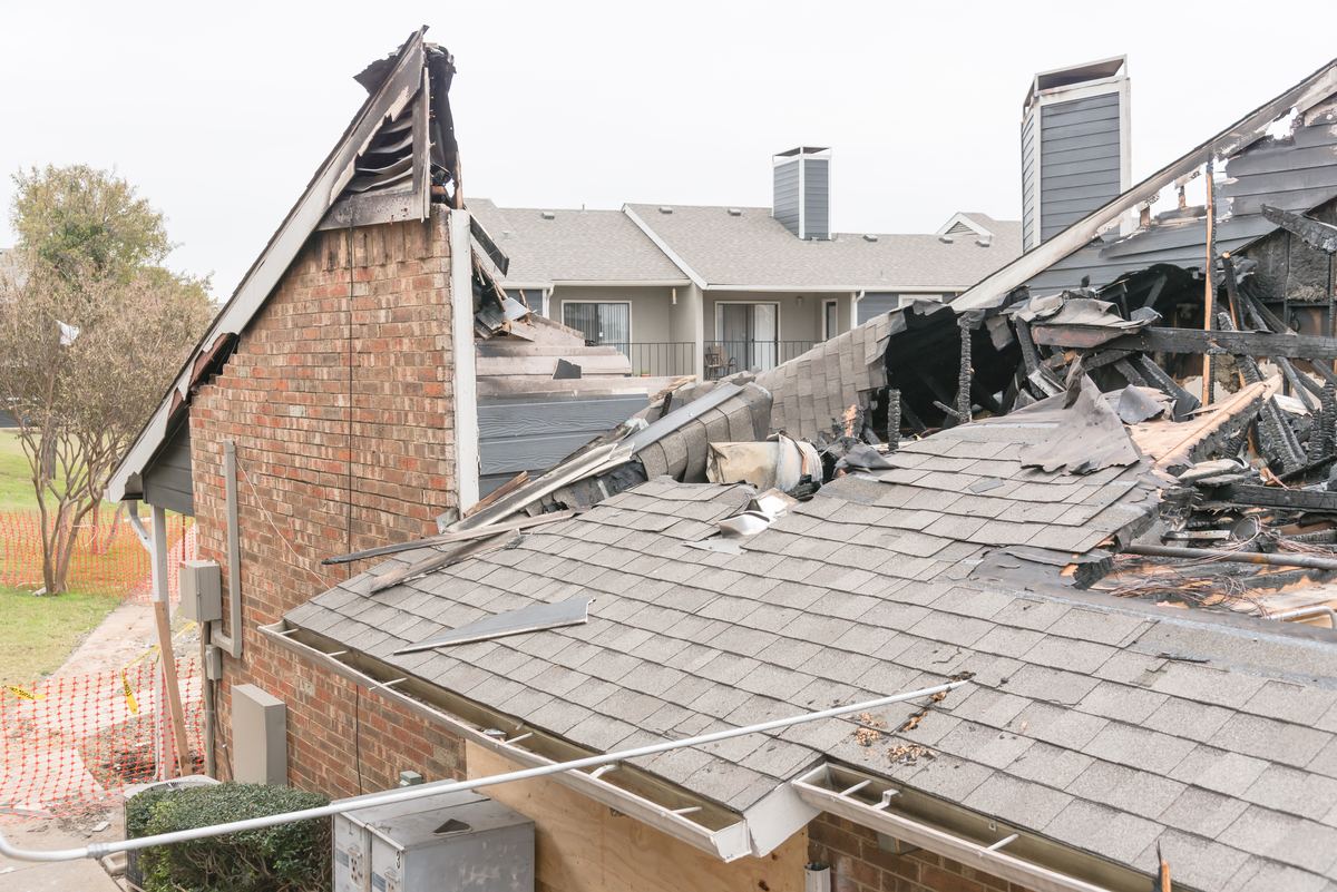 Fire damage to the shared roofline of an attached condo or HOA association building