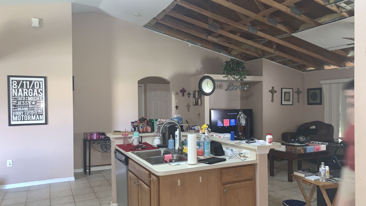 Collapsed ceiling from hurricane damage in a kitchen in Cape Coral, FL