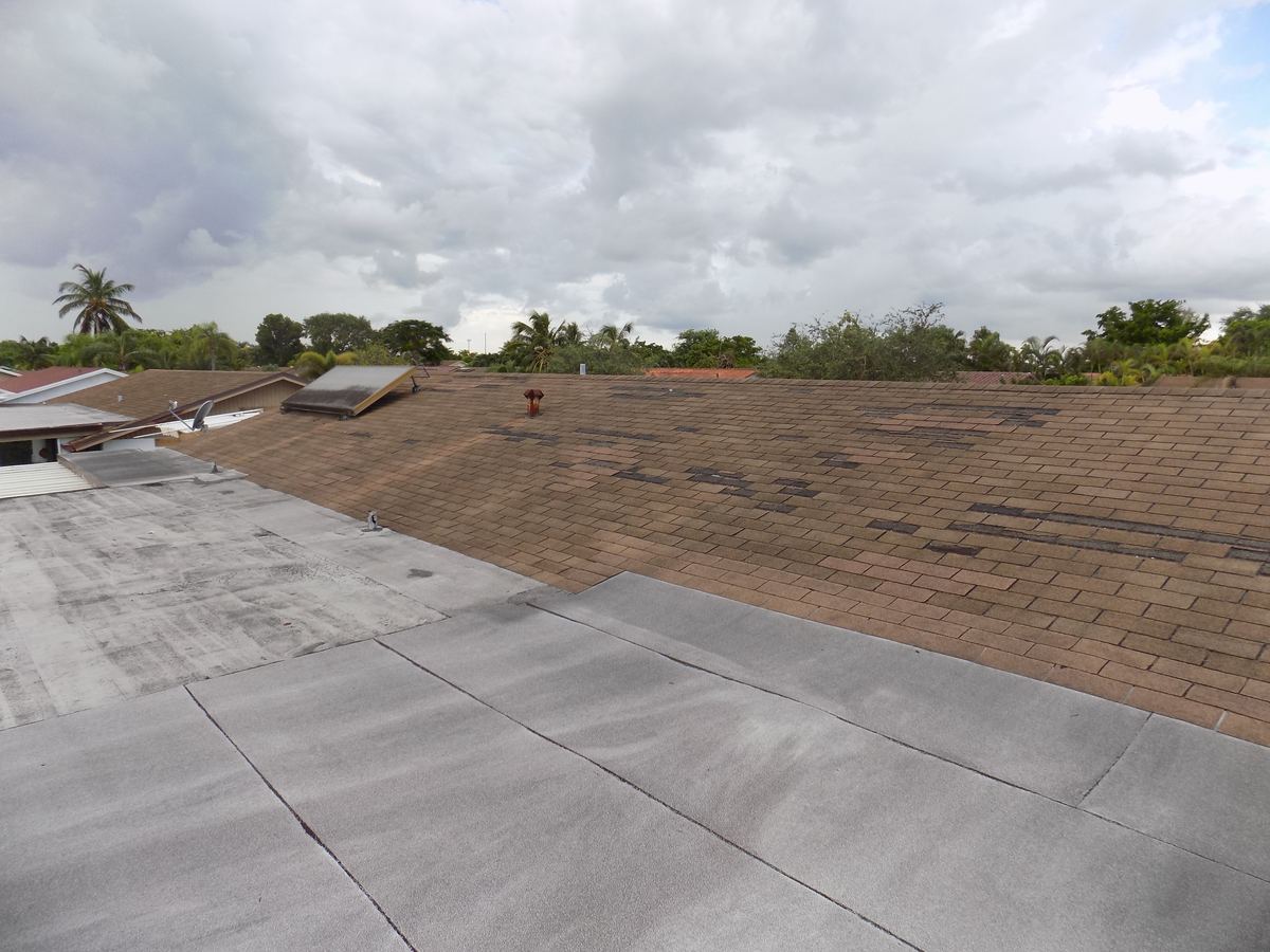 Hurricane roof damage at a home in Palmetto Bay, FL
