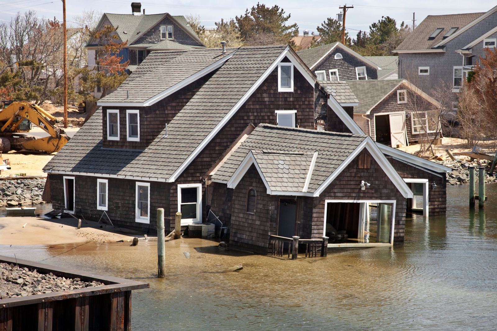 Shingled New Jersey shore house knocked off its foundation into the water by Superstorm Sandy