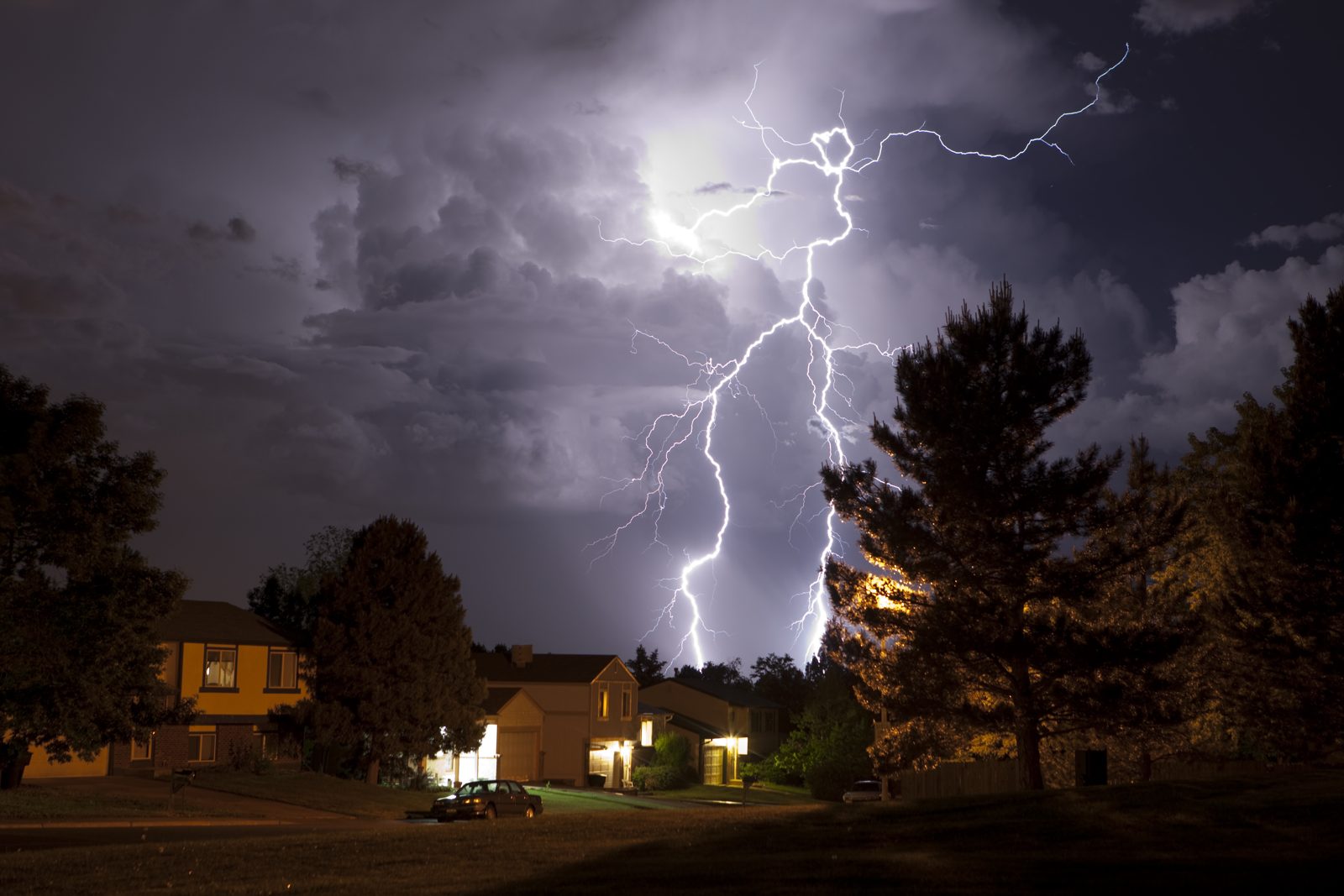 Lightning over a Florida neighborhood at night — Homeland Public Adjusters serves Hialeah Gardens property owners