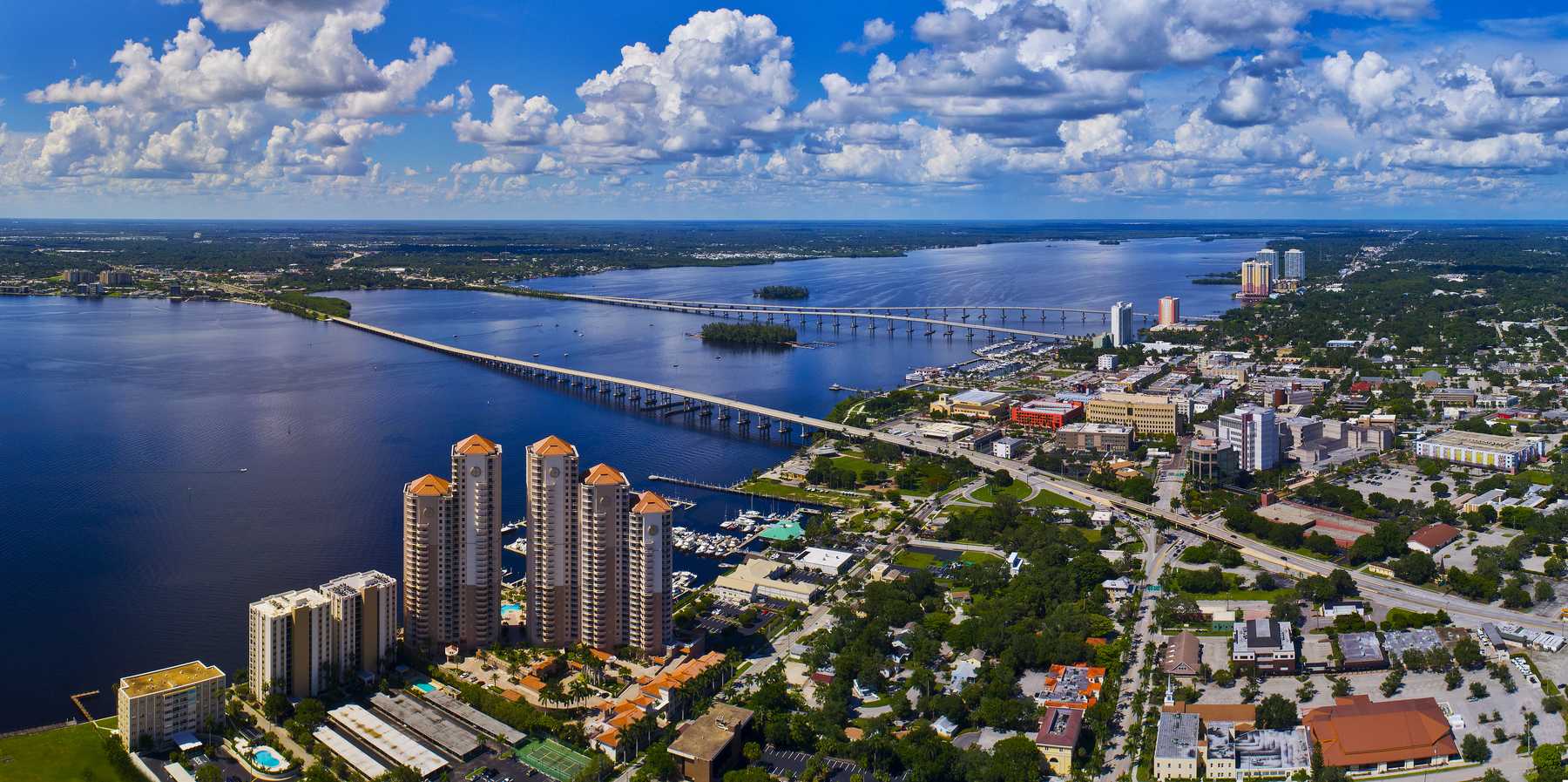Aerial view of downtown Fort Myers and the Caloosahatchee River in Lee County, Florida — Homeland Public Adjusters serves Lee County property owners