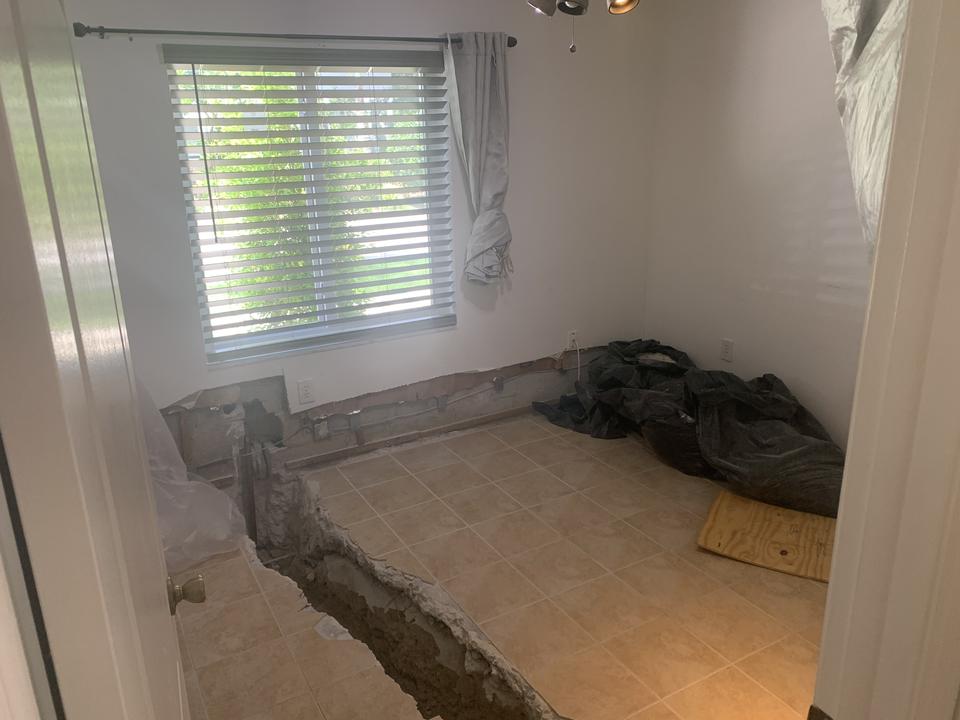 Floor cut open for a slab leak repair at a home in Miramar, FL