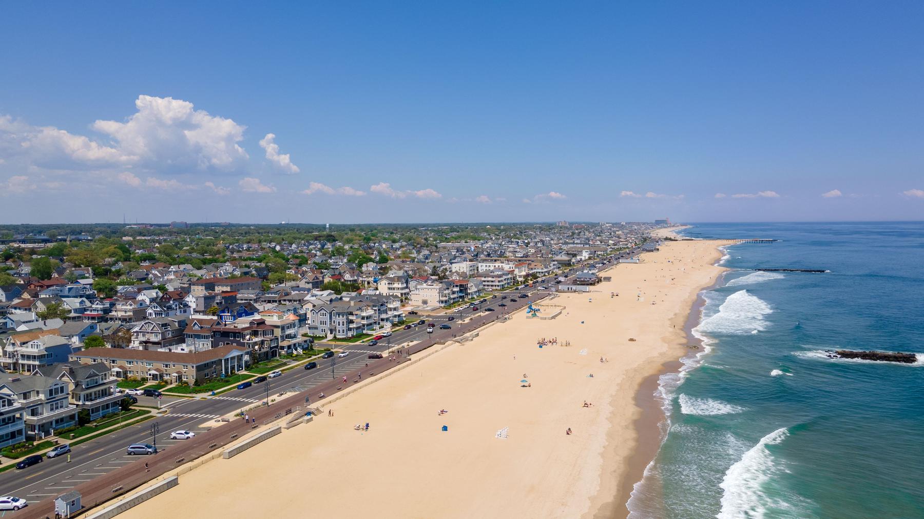 Aerial view of a Jersey Shore boardwalk town in Monmouth County, NJ — Homeland Public Adjusters serves Monmouth County property owners