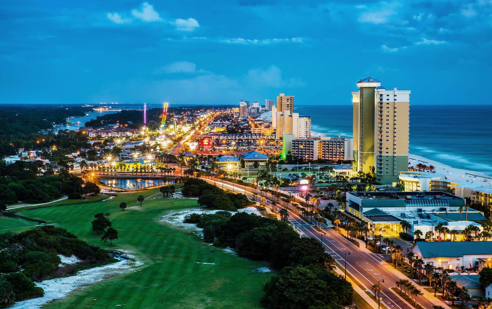 Aerial view of the Panama City, FL area coastline at dusk — Homeland Public Adjusters serves Panama City property owners