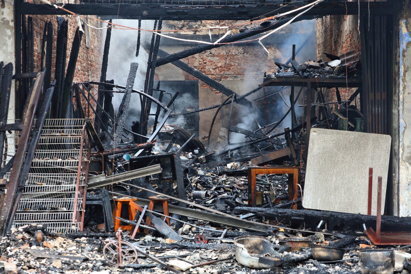 Burned-out restaurant kitchen after a commercial fire