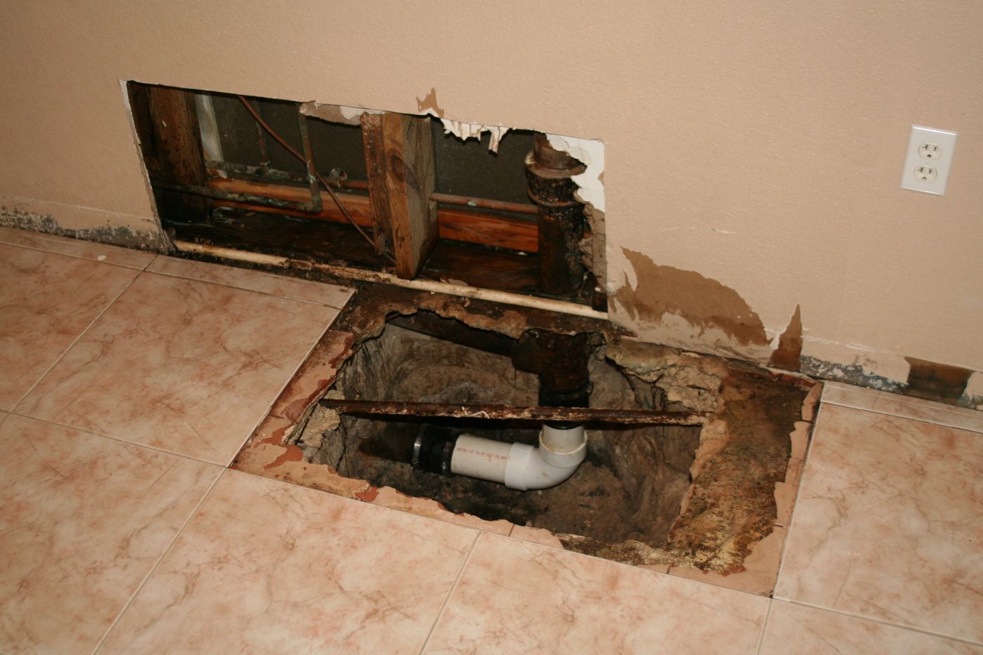 Water-damaged cabinetry base from a leak — the kind of claim Homeland documents for Nassau County, FL property owners