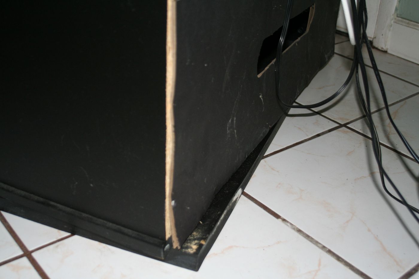 Water-damaged cabinetry base from a leak — the kind of claim Homeland documents for Pinellas County, FL property owners