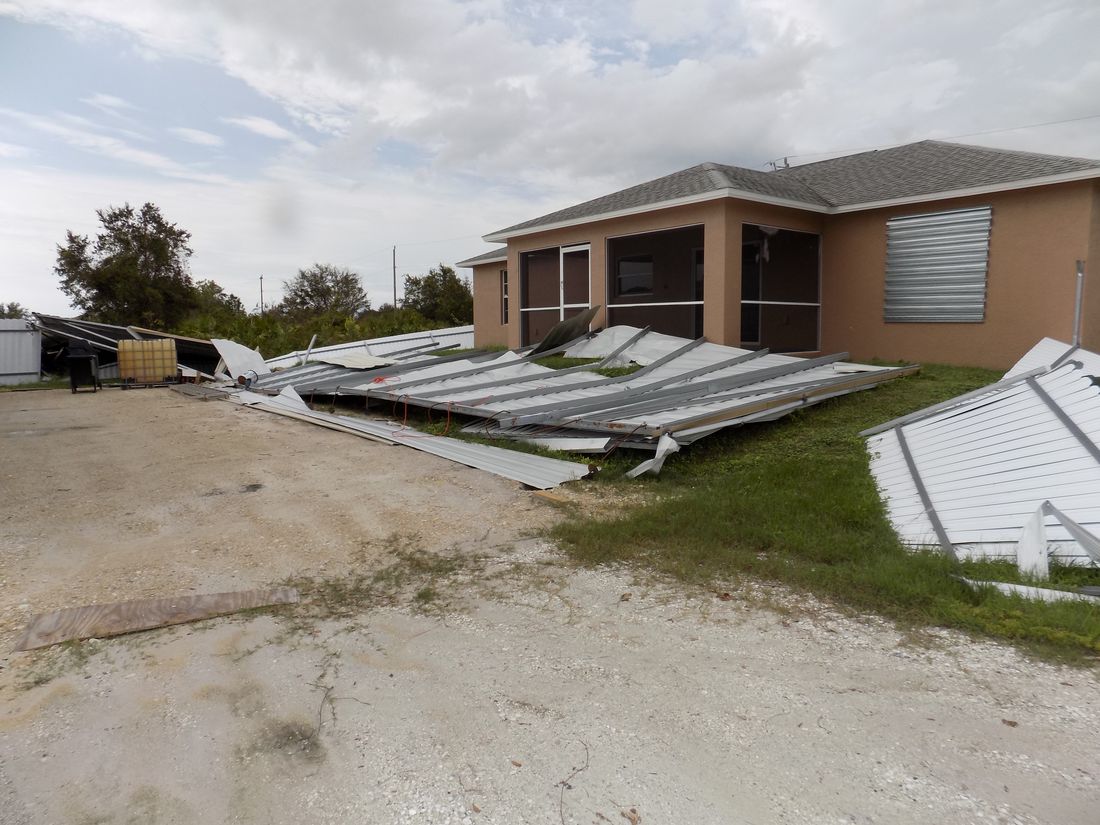 Garage roof torn off and collapsed by storm winds — the kind of claim Homeland handles for Tallahassee, FL property owners
