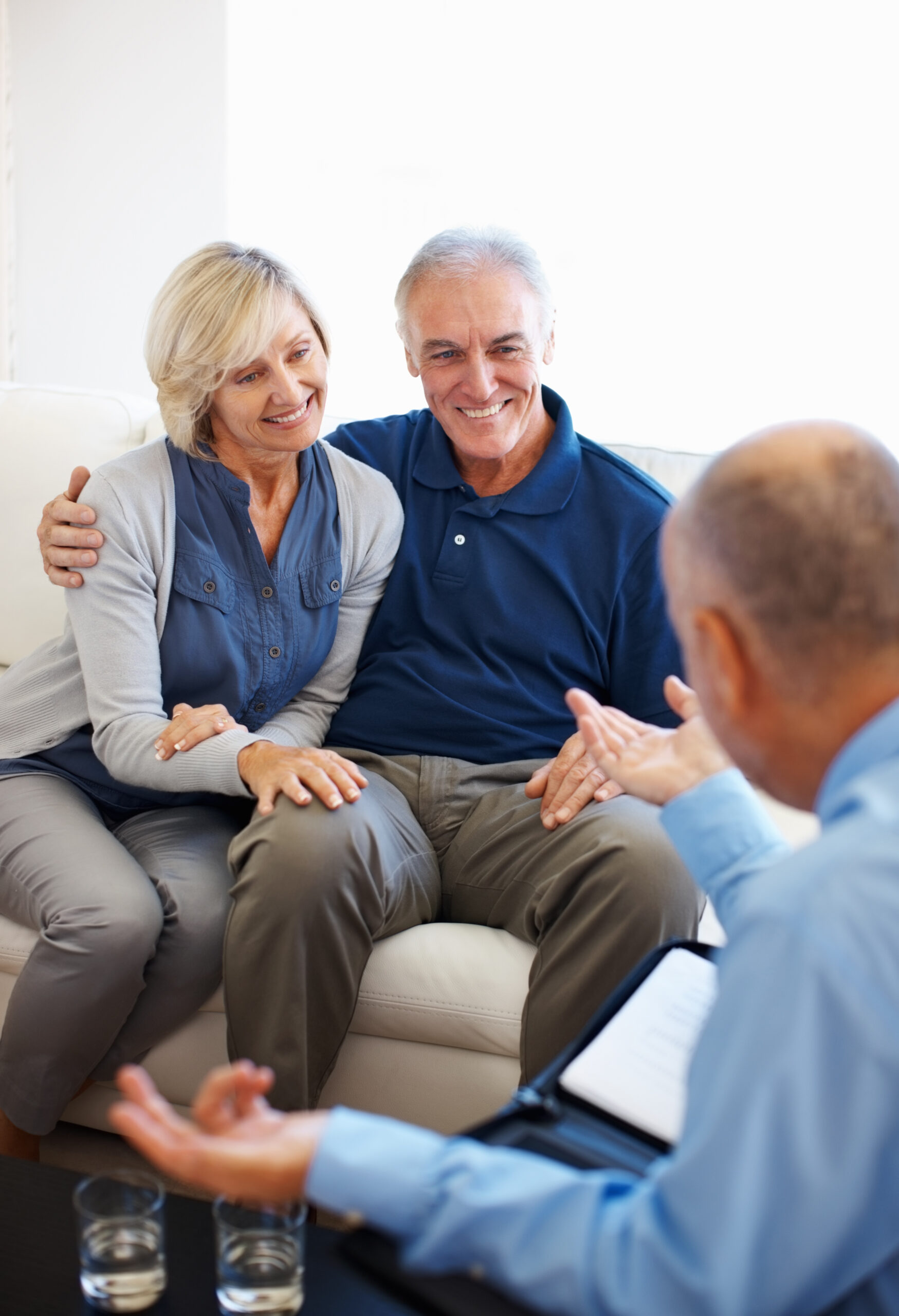 Senior couple listening to the financial advisor
